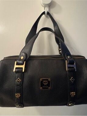 MCM Black Leather Duffel with Gold Hardware